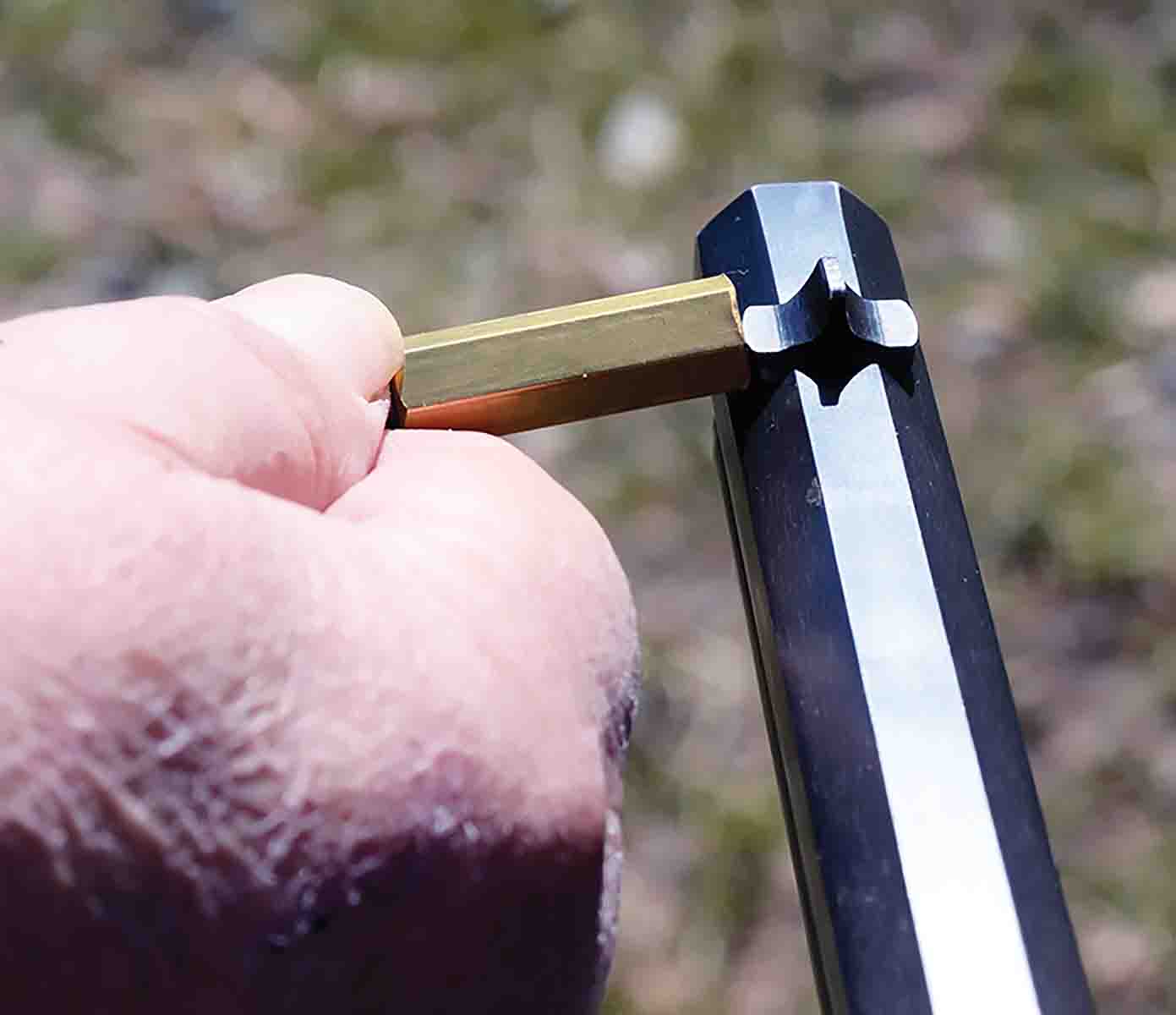 The Wyoming Sight Drifter only requires that the brass end is held against the sight, the spring compressed and then let go.